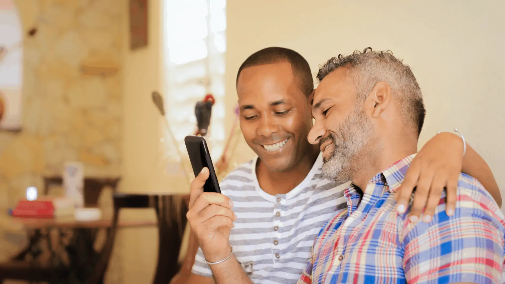 A male couple researches acupuncture practices in Richmond VA online, and reads about Chinese herbs or TCM herbal biotherapy. 