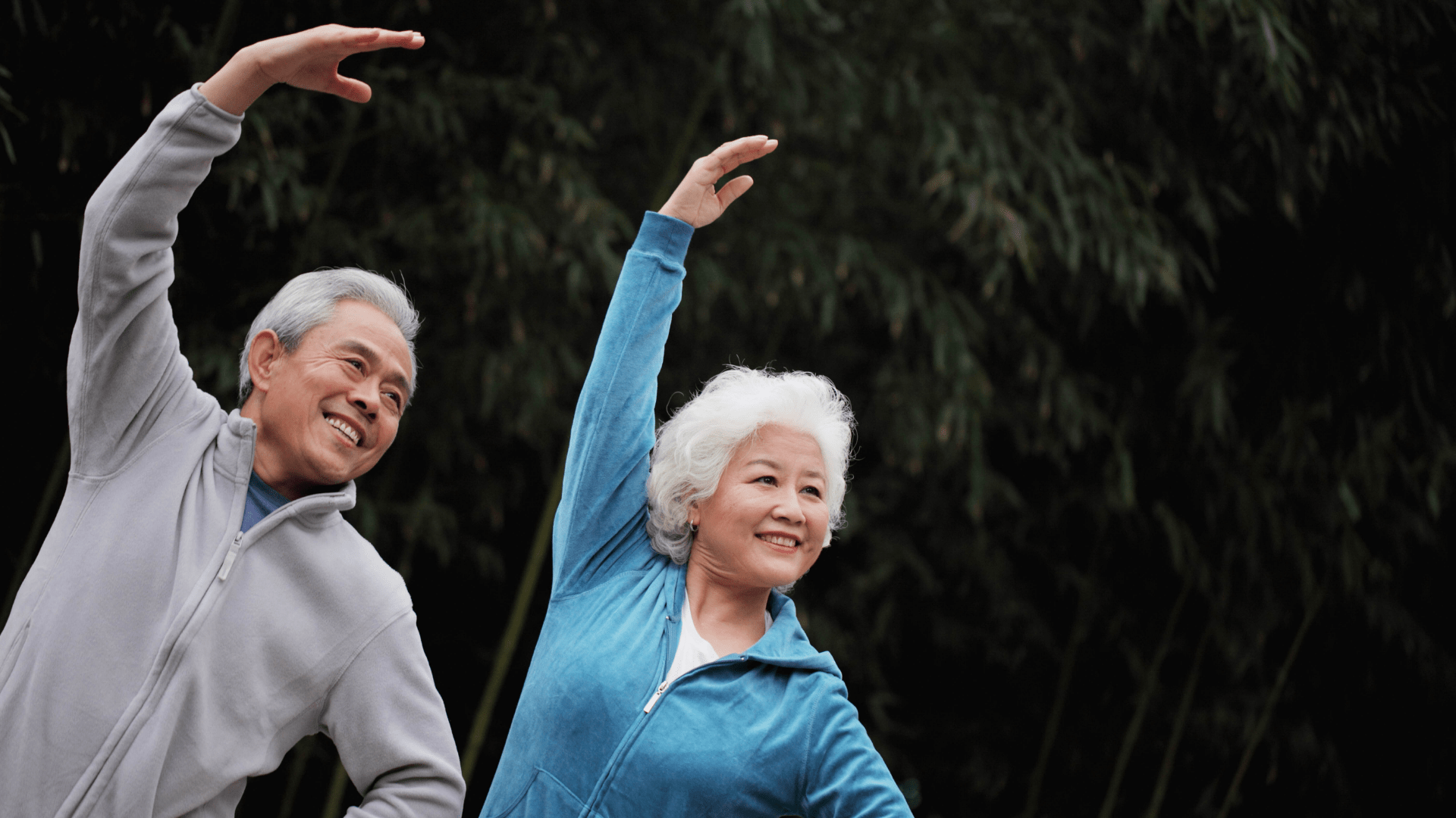 An older couple showing their flexibility have perhaps received acupuncture in Richmond VA. 