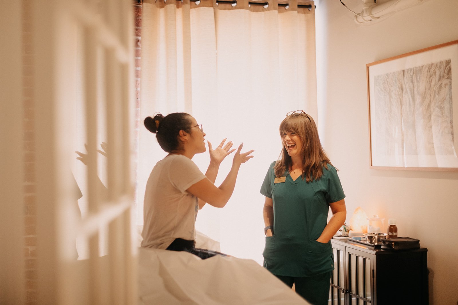 Provider and patient discuss acupuncture for chronic pain
